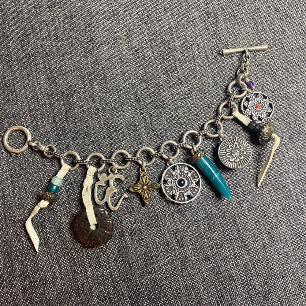 Lucky Brand silver toned toggle bracelet with 9 charms. - Picture 7 of 7